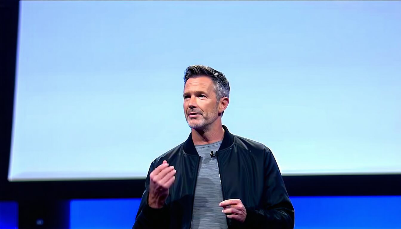 Evan King speaking on stage